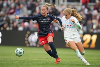 LOUISVILLE, KENTUCKY - NOVEMBER 20: Julia Roddar #6 of Washington Spirit holds off Makenzy Doniak #15 of the Chicago Red Stars during the NWSL Championship held at Lynn Family Stadium on November 20, 2021 in Louisville, Kentucky.  (Photo by Brad Smith/ISI