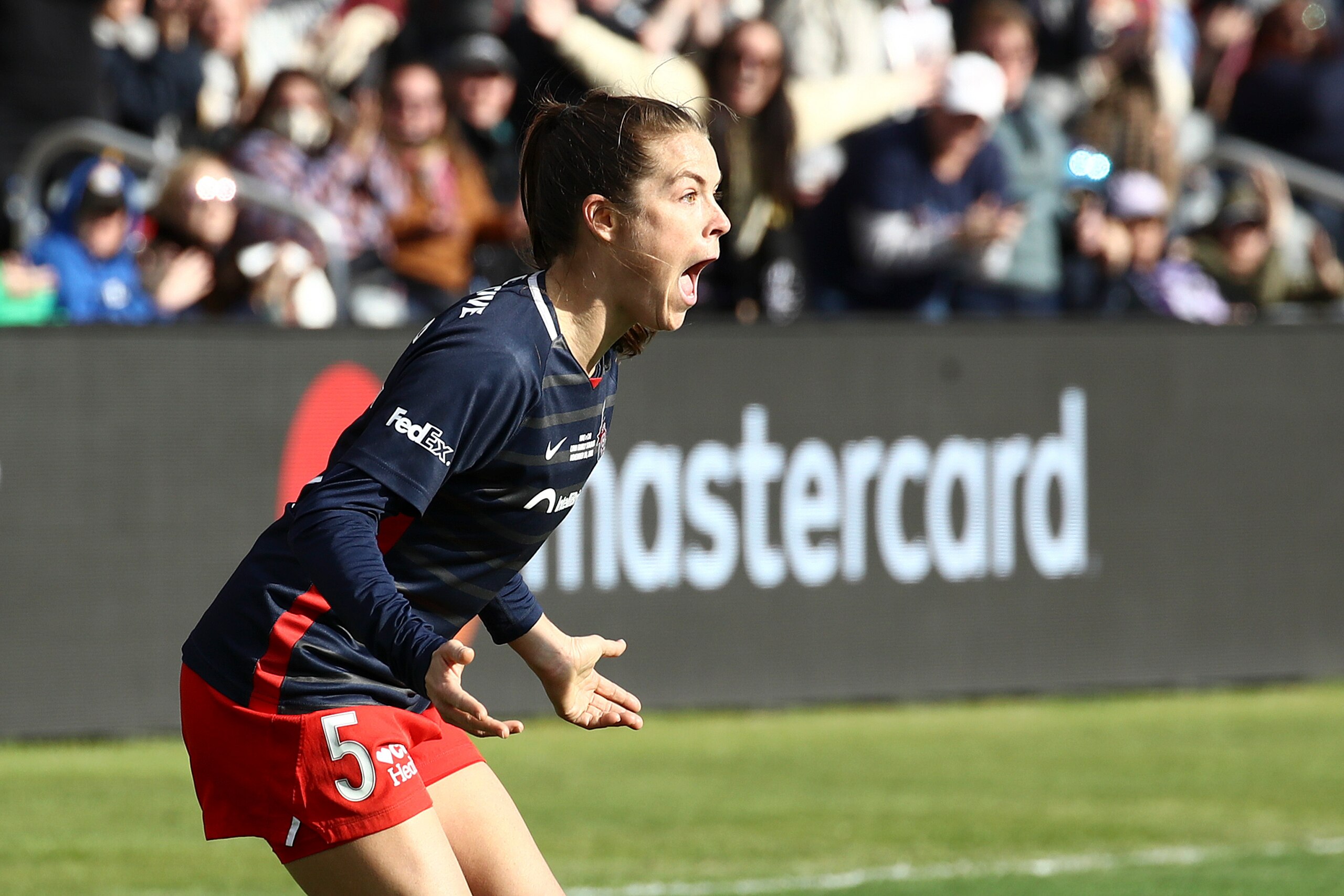 LOUISVILLE, KENTUCKY - NOVEMBER 20: Kelley O'Hara #5 of Washington Spirit celebrates after scoring during extra time against Chicago Red Stars during the NWSL Championship held at Lynn Family Stadium on November 20, 2021 in Louisville, Kentucky. (Photo by