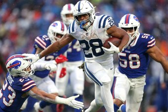 ORCHARD PARK, NEW YORK - NOVEMBER 21: Jonathan Taylor #28 of the Indianapolis Colts runs the ball for a touchdown in the game against the Buffalo Bills during the third quarter at Highmark Stadium on November 21, 2021 in Orchard Park, New York. (Photo by 