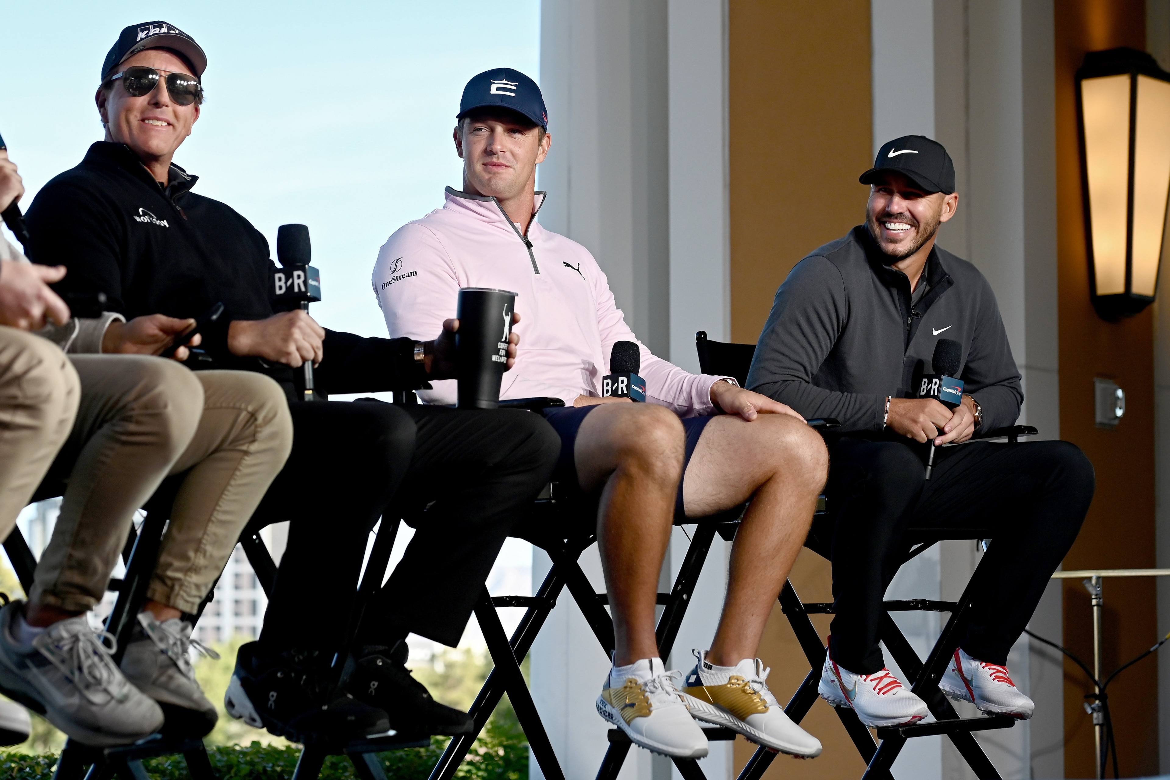 LAS VEGAS, NEVADA - NOVEMBER 26: (L-R) Phil Mickelson, Bryson DeChambeau, and Brooks Koepka attend a press conference during Capital One's The Match V: Bryson v Brooks at Wynn Golf Course on November 26, 2021 in Las Vegas, Nevada. (Photo by David Becker/G