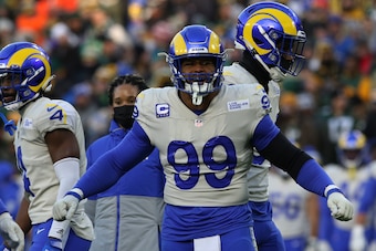 GREEN BAY, WI - NOVEMBER 28: Los Angeles Rams defensive end Aaron Donald (99) reacts to a play during a game between the Green Bay Packers and the Los Angeles Rams at Lambeau Field on November 28, 2021 in Green Bay, WI. (Photo by Larry Radloff/Icon Sports