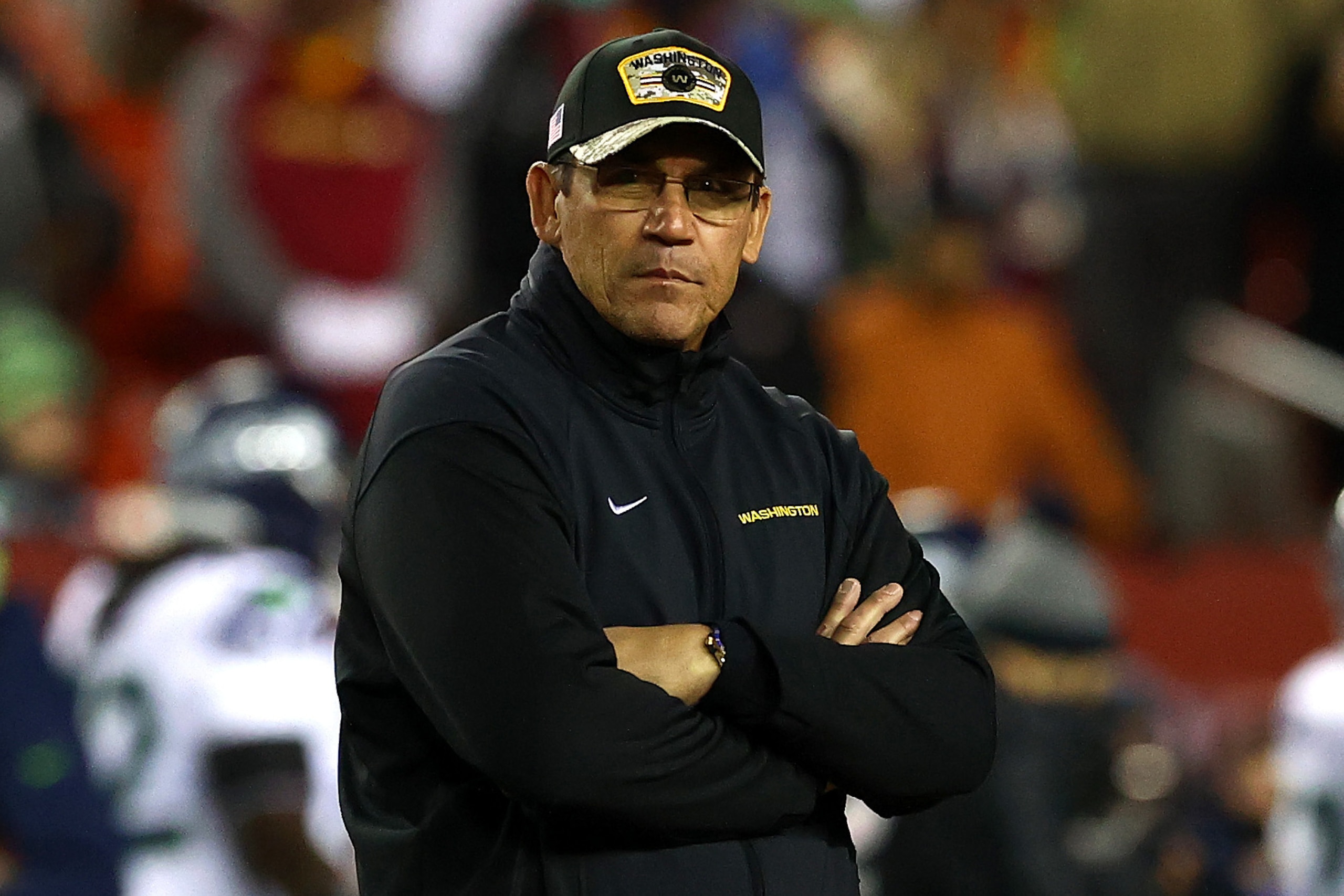 LANDOVER, MARYLAND - NOVEMBER 29: Head coach Ron Rivera of the Washington Football Team looks on during warmups before the game against the Seattle Seahawks at FedExField on November 29, 2021 in Landover, Maryland. (Photo by Todd Olszewski/Getty Images)