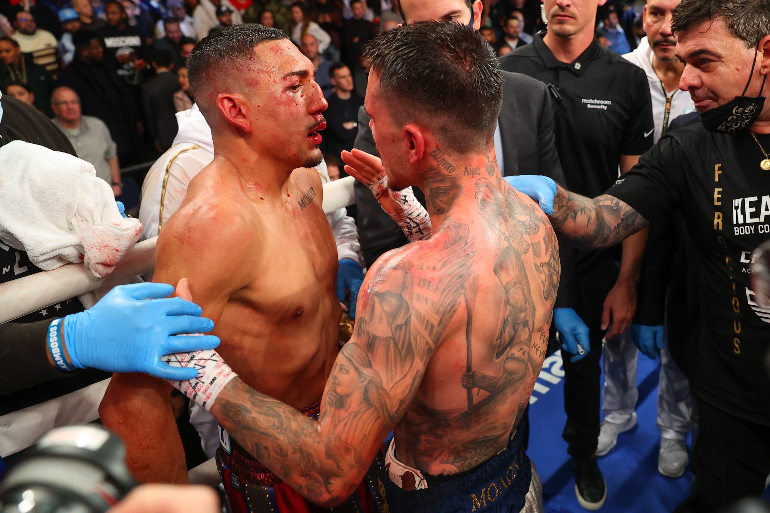NEW YORK, NY - NOVEMBER 27:   George Kambosos Jr and Teofimo Lopez hug after their championship bout for Lopezs Undisputed Lightweight title at The Hulu Theater at Madison Square Garden on November 27, 2021 in New York, New York (Photo by Rich Graessle/Ic