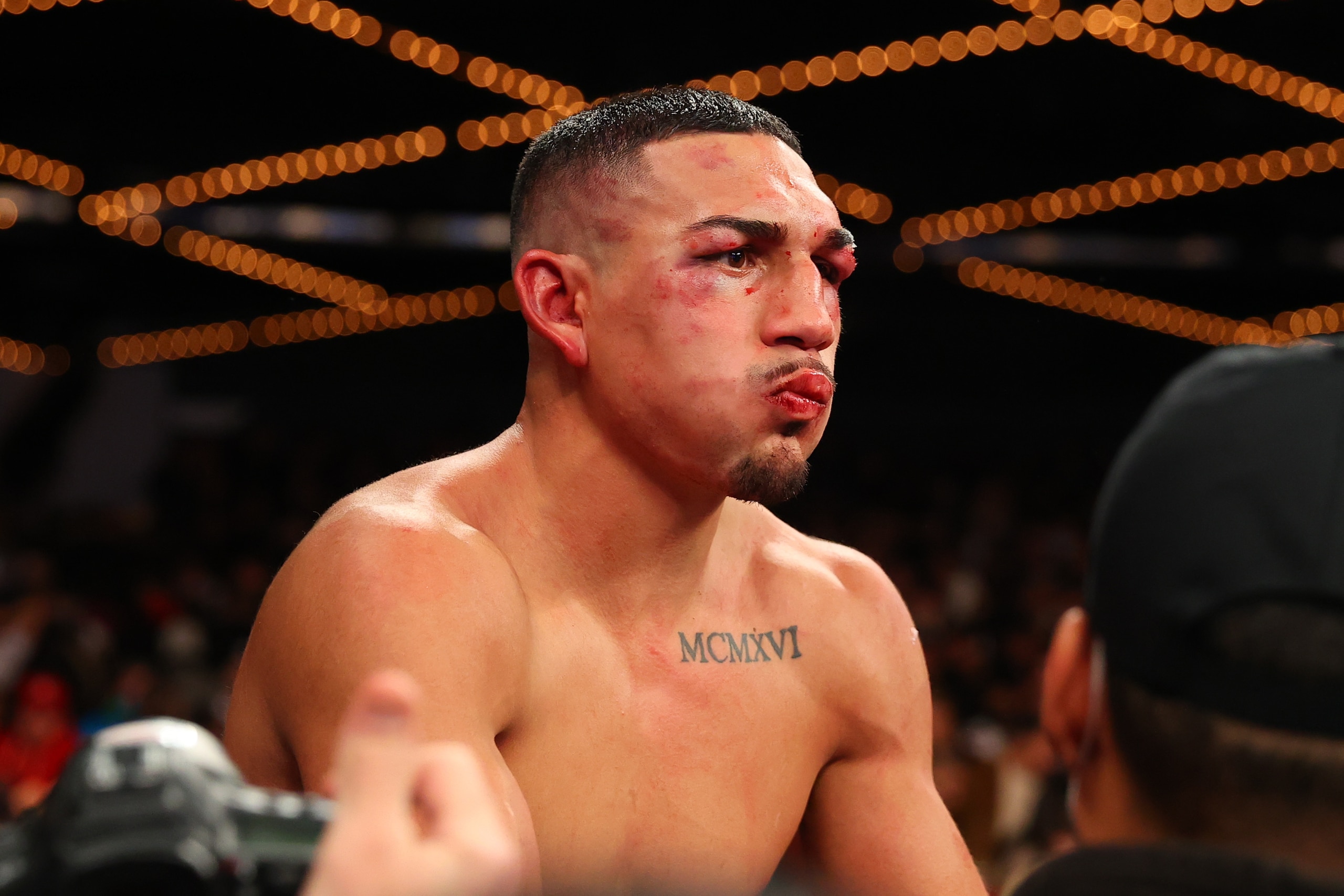NEW YORK, NY - NOVEMBER 27:   Teofimo Lopez sits on the ring ropes after losing Undisputed Lightweight title to George Kambosos Jr. at The Hulu Theater at Madison Square Garden on November 27, 2021 in New York, New York (Photo by Rich Graessle/Icon Sports
