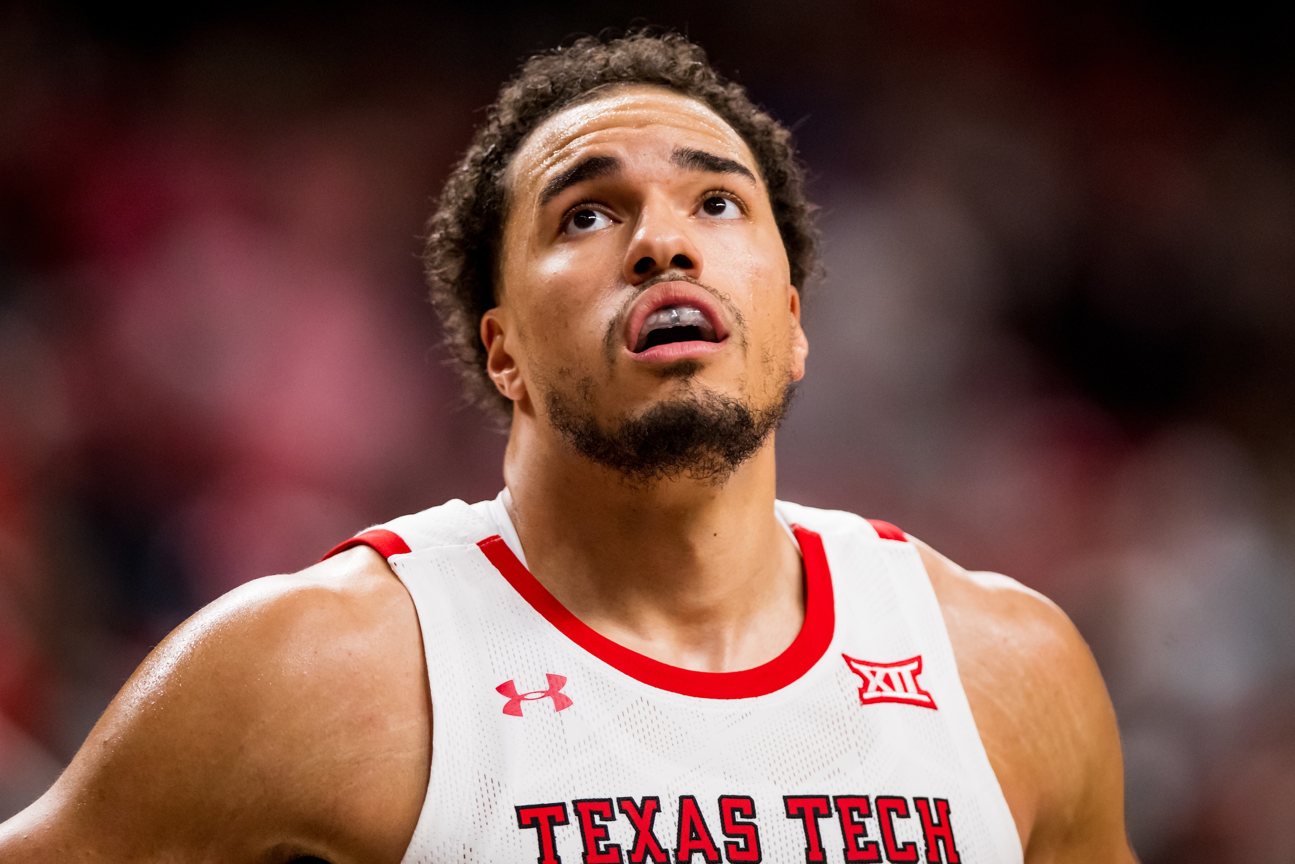 LUBBOCK, TEXAS - NOVEMBER 09: Forward Marcus Santos-Silva #14 of the Texas Tech Red Raiders looks on during the second half of the college basketball game against the North Florida Ospreys at United Supermarkets Arena on November 09, 2021 in Lubbock, Texa
