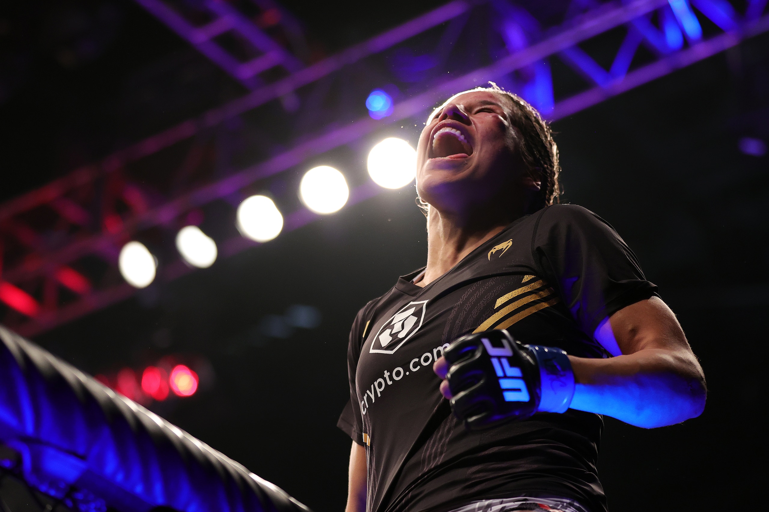 LAS VEGAS, NEVADA - DECEMBER 11: Julianna Pena celebrates after defeating Amanda Nunes of Brazil to win the women's bantamweight title during the UFC 269 event at T-Mobile Arena on December 11, 2021 in Las Vegas, Nevada. (Photo by Carmen Mandato/Getty Ima