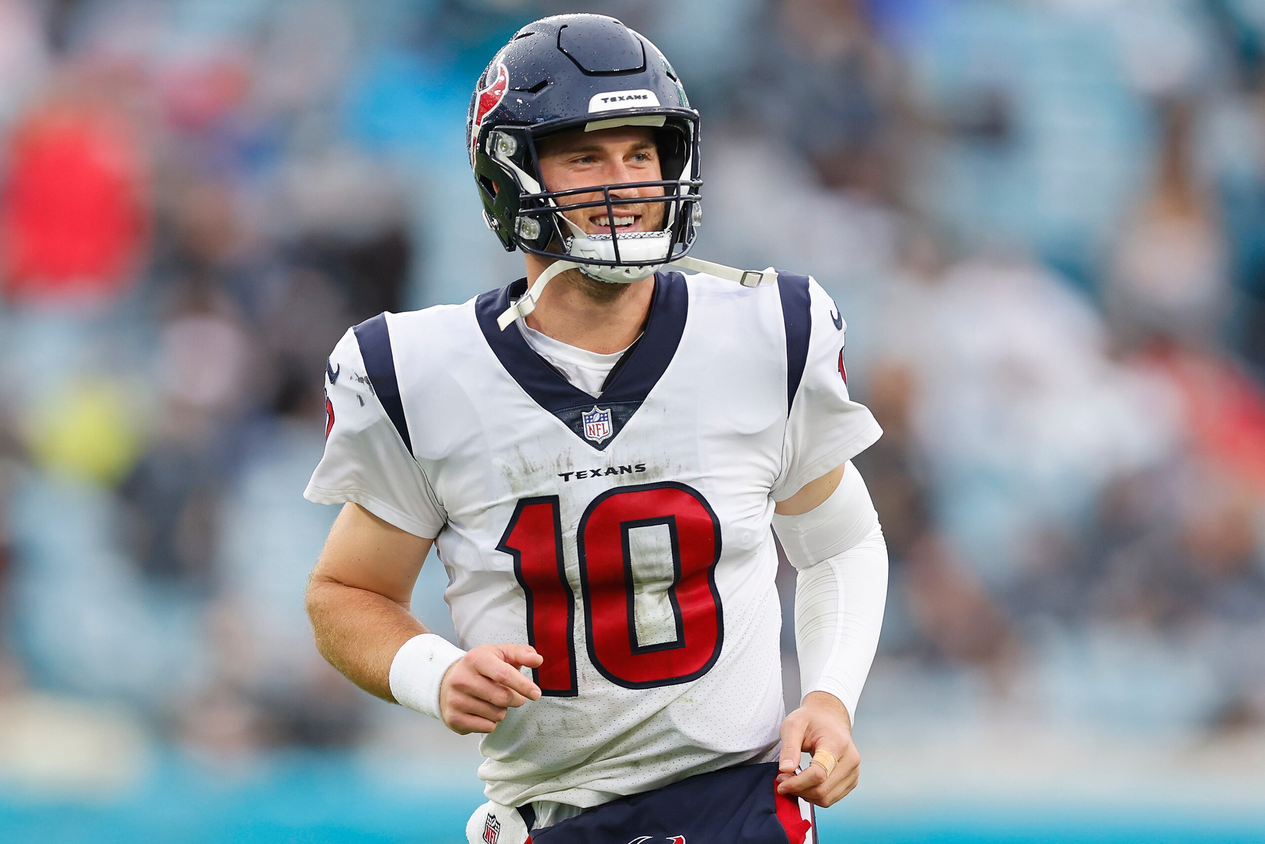 JACKSONVILLE, FLORIDA - DECEMBER 19: Davis Mills #10 of the Houston Texans celebrates a touchdown during the fourth quarter against the Jacksonville Jaguars at TIAA Bank Field on December 19, 2021 in Jacksonville, Florida. (Photo by Michael Reaves/Getty I