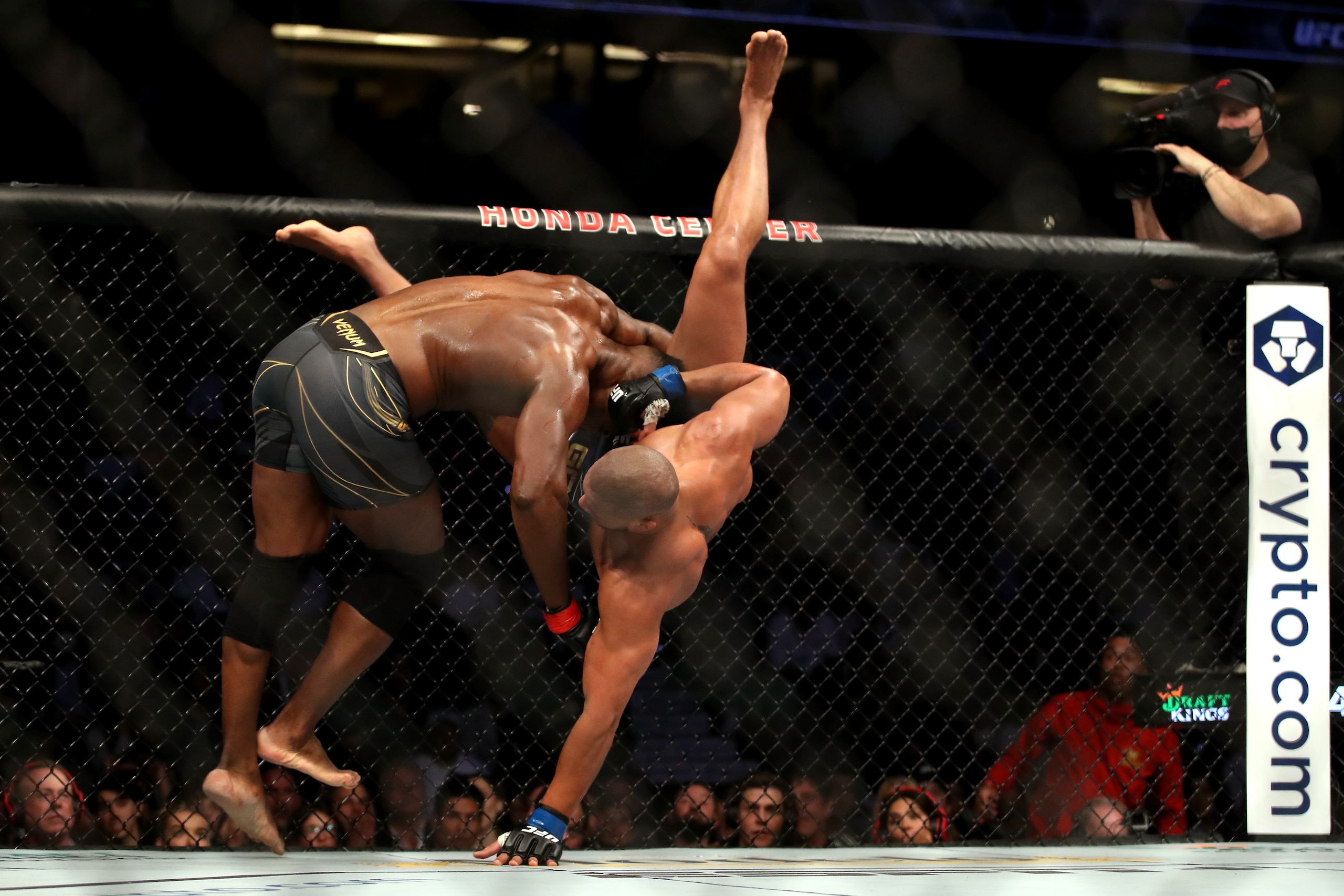 ANAHEIM, CALIFORNIA - JANUARY 22: Francis Ngannou of Cameroon (L) tackles Ciryl Gane of France in their heavyweight title fight during the UFC 270 event at Honda Center on January 22, 2022 in Anaheim, California. (Photo by Katelyn Mulcahy/Getty Images) ANAHEIM, CALIFORNIA - JANUARY 22: Francis Ngannou of Cameroon (L) tackles Ciryl Gane of France in their heavyweight title fight during the UFC 270 event at Honda Center on January 22, 2022 in Anaheim, California. (Photo by Katelyn Mulcahy/Getty Images)