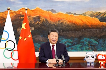 Chinese President Xi Jinping delivers a video address at the opening ceremony of the 139th session of the International Olympic Committee IOC on Feb. 3, 2022. (Photo by Huang Jingwen/Xinhua via Getty Images)