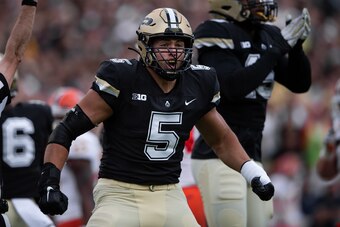 WEST LAFAYETTE, IN - SEPTEMBER 25: Purdue Boilermakers defensive end George Karlaftis (5) celebrates after a defensive stop during the college football game between the Purdue Boilermakers and Illinois Fighting Illini on September 25, 2021, at Ross-Ade St