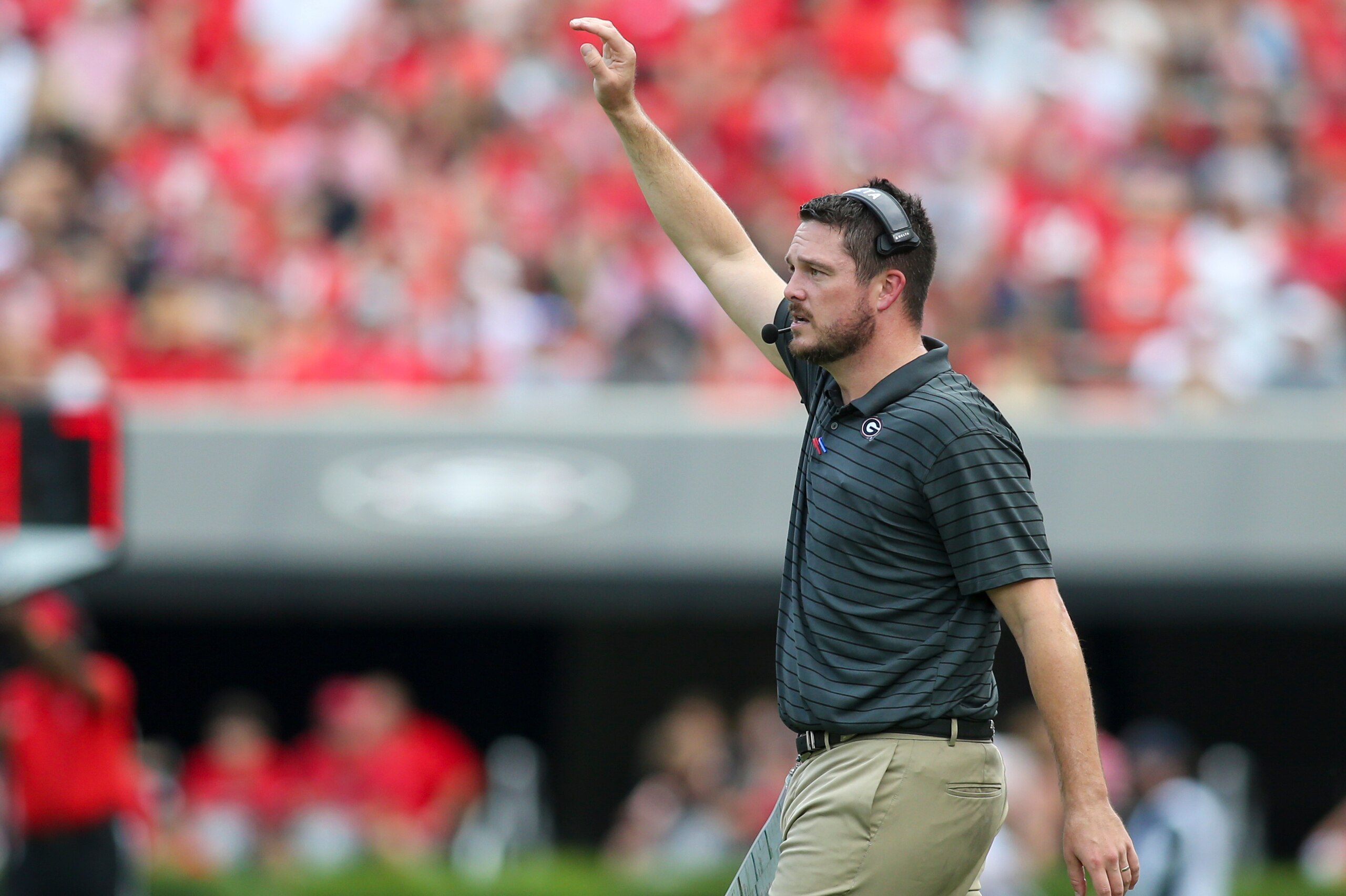 ATHENS, GA - SEPTEMBER 11: Defensive coordinator Dan Lanning of the Georgia Bulldogs calls a play against the UAB Blazers in the first half at Sanford Stadium on September 11, 2021 in Athens, Georgia. (Photo by Brett Davis/Getty Images)