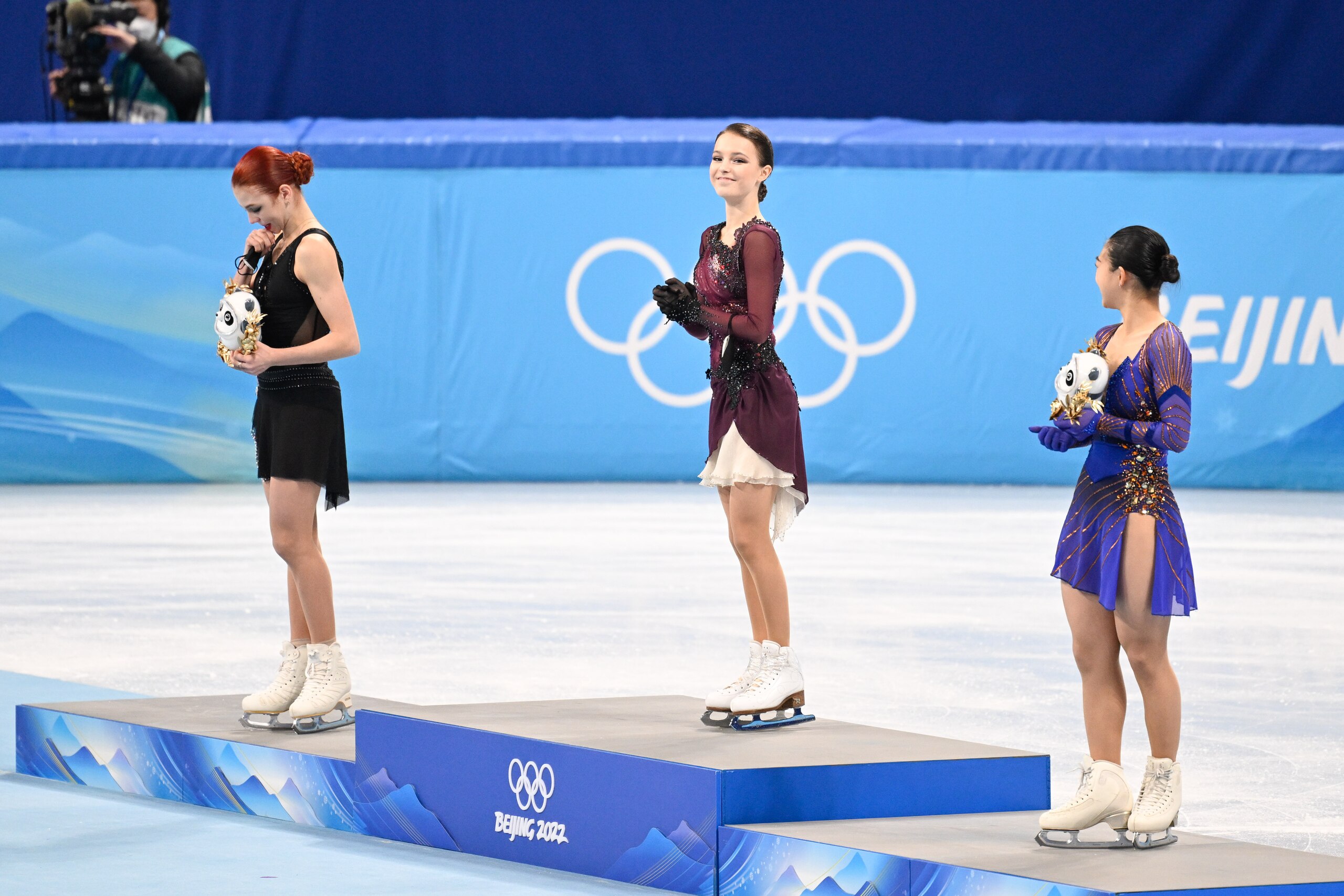 BEIJING, CHINA - FEBRUARY 17: Alexandra Trusova of Russia, Anna Scherbakova of Russia and Kaori Sakamoto of Japan on the podest after the women's figure skating free skating during the Beijing 2022 Winter Olympics at Capital Indoor Stadium on February 17, BEIJING, CHINA - FEBRUARY 17: Alexandra Trusova of Russia, Anna Scherbakova of Russia and Kaori Sakamoto of Japan on the podest after the women's figure skating free skating during the Beijing 2022 Winter Olympics at Capital Indoor Stadium on February 17,
