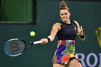 Maria Sakkari of Greece hits a forehand return to Paula Badosa of Spain in their WTA semifinal match at the Indian Wells tennis tournament on March 18, 2022 in Indian Wells, California. - Sakkari defeated Badosa 6-2, 4-6, 6-1. (Photo by Frederic J. BROWN 
