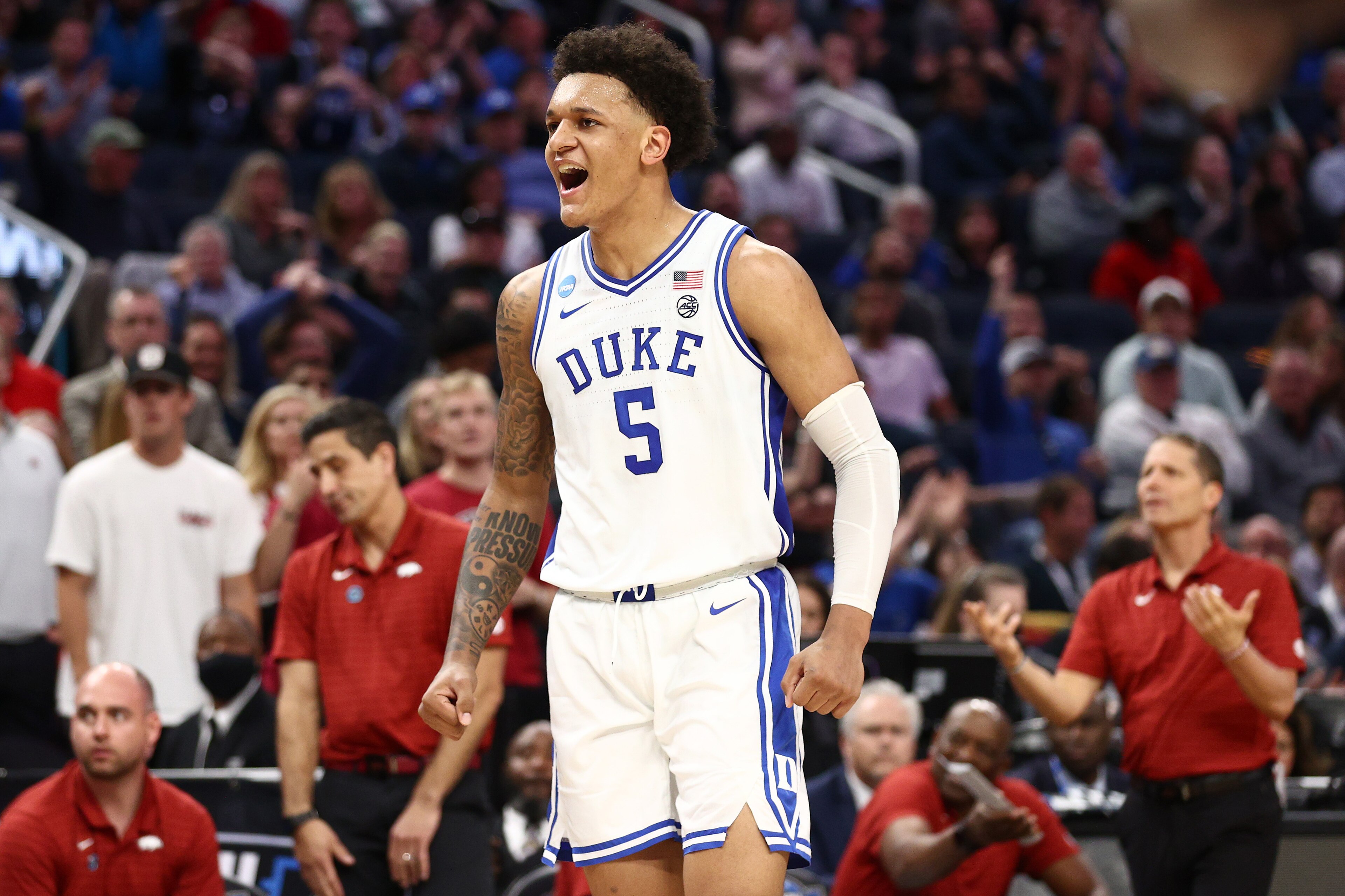 SAN FRANCISCO, CALIFORNIA - MARCH 26: Paolo Banchero #5 of the Duke Blue Devils celebrates after a play during the first half against the Arkansas Razorbacks in the NCAA Men's Basketball Tournament Elite 8 Round at Chase Center on March 26, 2022 in San Fr