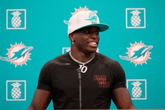 MIAMI GARDENS, FLORIDA - MARCH 24: Tyreek Hill speaks with the media after being introduced by the Miami Dolphins at Baptist Health Training Complex on March 24, 2022 in Miami Gardens, Florida. (Photo by Mark Brown/Getty Images)