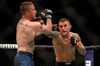 GLENDALE, AZ - APRIL 14:  (R-L) Dustin Poirier punches Justin Gaethje in their lightweight fight during the UFC Fight Night event at Gila River Arena on April 14, 2018 in Glendale, Arizona.  (Photo by Jennifer Stewart/Getty Images)
