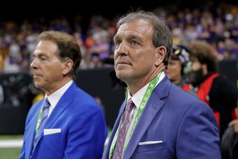 NEW ORLEANS, LA - JANUARY 13: Head Coach Nick Saban of the Alabama Crimson Tide and Head Coach Jimbo Fisher of the Texas A&M Aggies on the sidelines talking during of the College Football Playoff National Championship game with the LSU Tigers playing agai