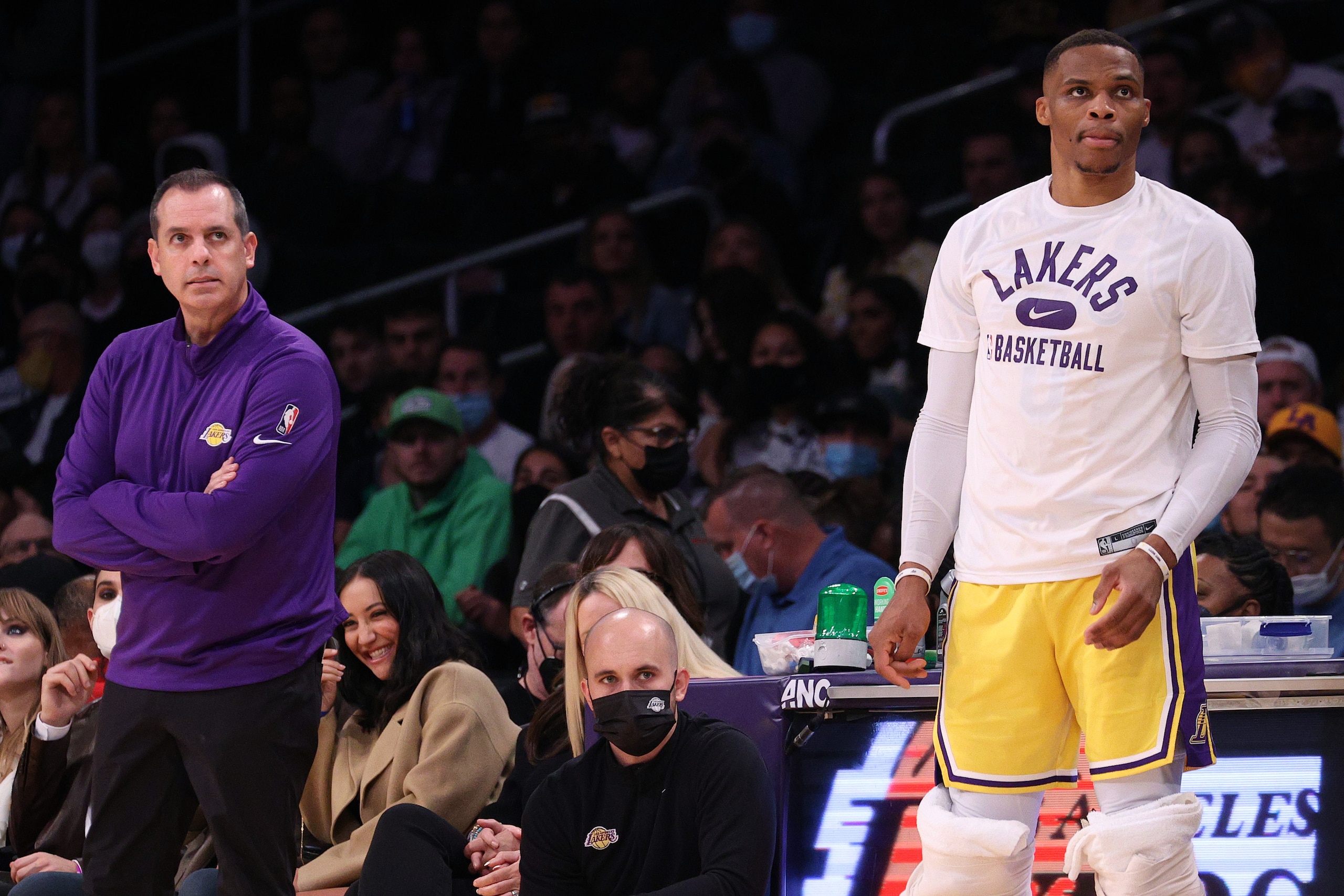 LOS ANGELES, CALIFORNIA - NOVEMBER 04: Russell Westbrook #0 and head coach Frank Vogel watch play during the first half against the Oklahoma City Thunder at Staples Center on November 04, 2021 in Los Angeles, California. (Photo by Harry How/Getty Images)