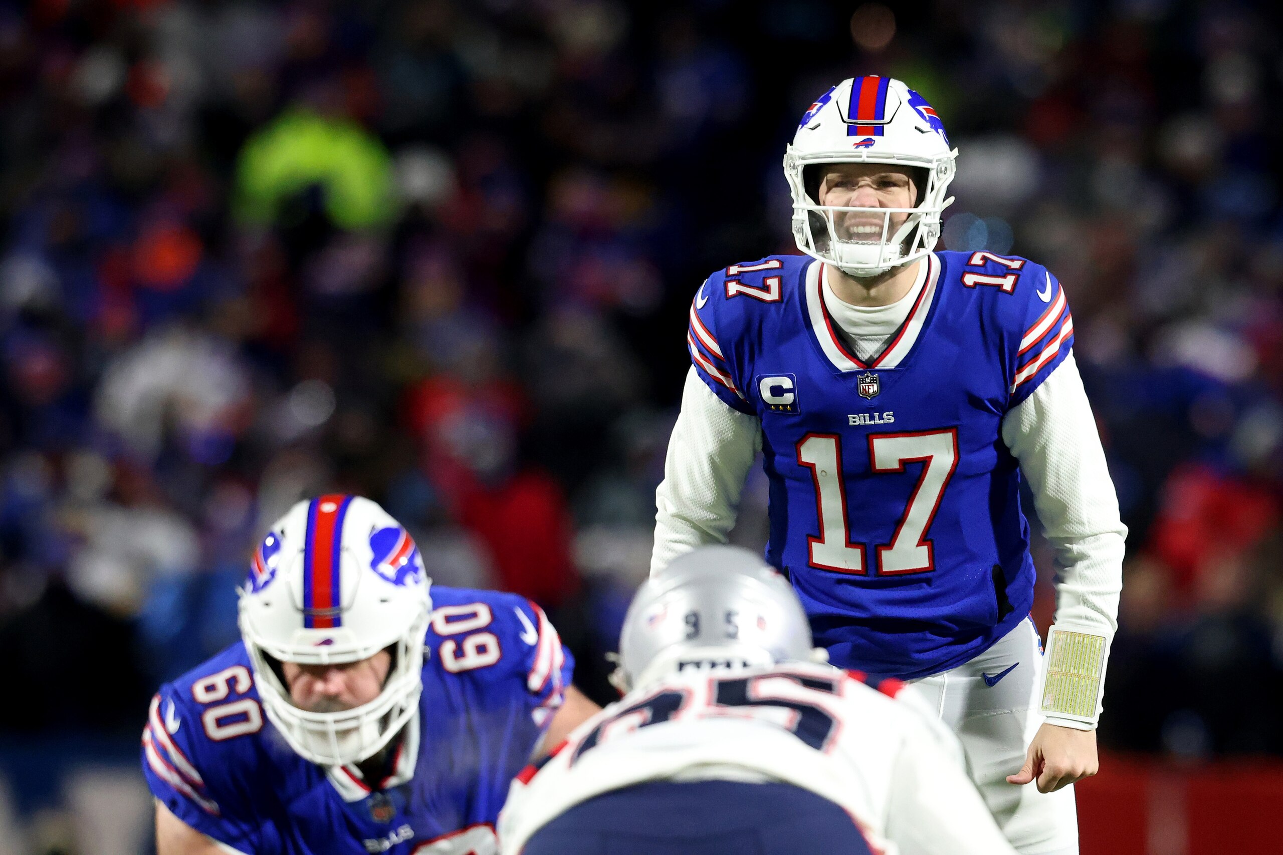 BUFFALO, NEW YORK - JANUARY 15: Josh Allen #17 of the Buffalo Bills waits for the snap during the first quarter against the New England Patriots at Highmark Stadium on January 15, 2022 in Buffalo, New York. (Photo by Bryan M. Bennett/Getty Images)