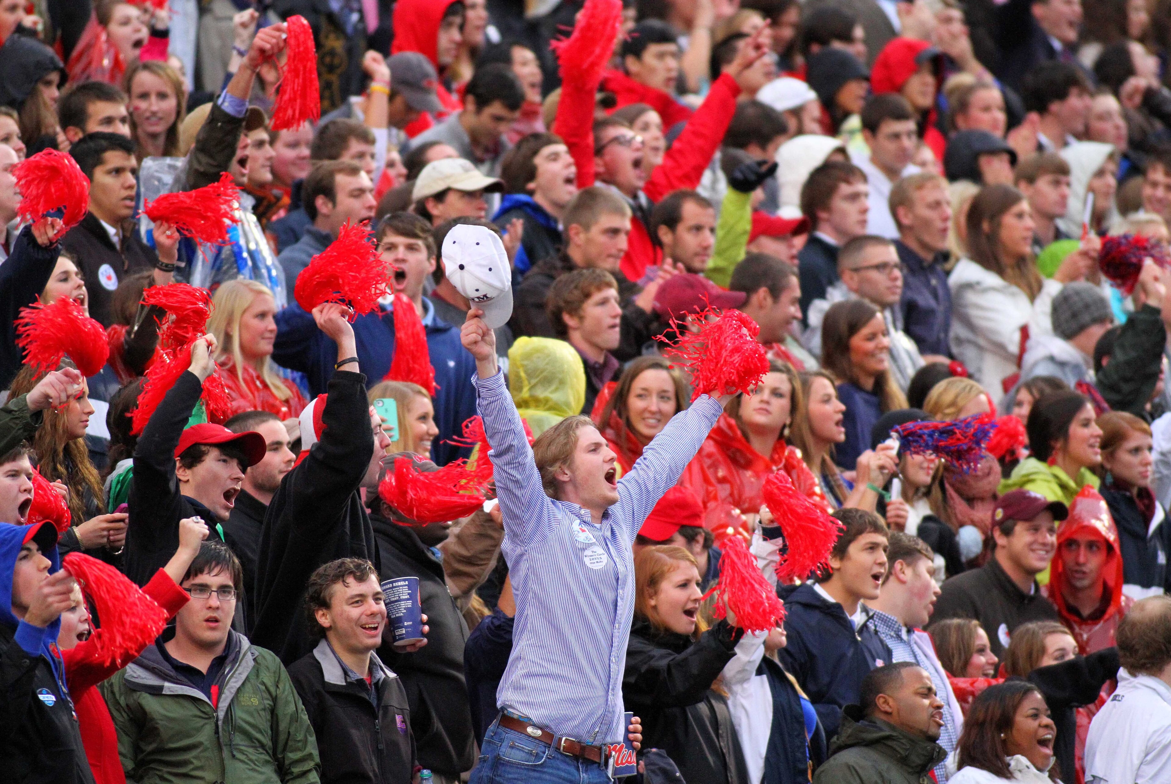 Oct 5, 2012; Oxford, MS, USA;  Mississippi Rebels fans doing the cheer Hotty Toddy before the game against the Texas A&M Aggies at Vaught Hemingway Stadium.  Mandatory Credit: Spruce DerdenUSA TODAY Sports