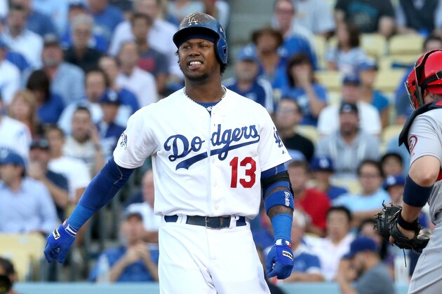 LOS ANGELES, CA - OCTOBER 15:  Hanley Ramirez #13 of the Los Angeles Dodgers reacts after striking out in the first inning against the St. Louis Cardinals in Game Four of the National League Championship Series at Dodger Stadium on October 15, 2013 in Los Angeles, California.  (Photo by Stephen Dunn/Getty Images)
