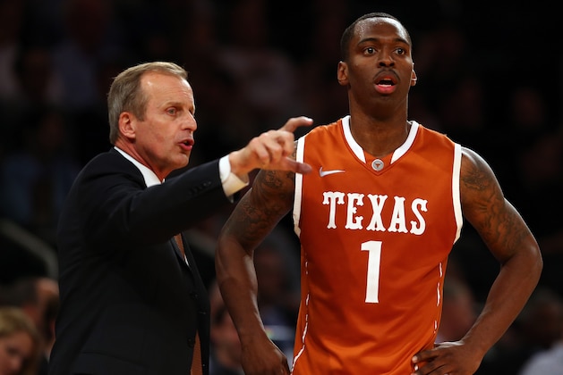 NEW YORK, NY - DECEMBER 04:  Head coach Rick Barnes talks with Sheldon McClellan #1 of the Texas Longhorns in the second half against the Georgetown Hoyas during the Jimmy V Classic on December 4, 2012 at Madison Square Garden in New York City. The Georgetown Hoyas defeated the Texas Longhorns 64-41.  (Photo by Elsa/Getty Images)
