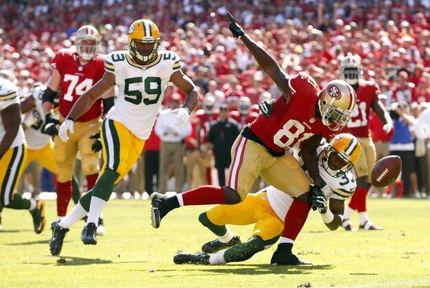 Sep 8, 2013; San Francisco, CA, USA; Green Bay Packers cornerback Sam Shields (37) breaks up a pass intended for San Francisco 49ers wide receiver Anquan Boldin (81) in the third quarter at Candlestick Park. The 49ers defeated the Packers 34-28. Mandatory Credit: Cary Edmondson-USA TODAY Sports