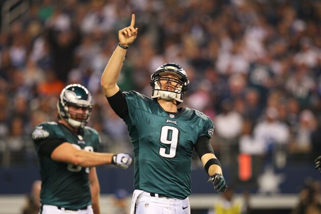 ARLINGTON, TX - DECEMBER 29:  Nick Foles #9 of the Philadelphia Eagles celebrates a second quarter touchdown against the Dallas Cowboys at Cowboys Stadium on December 29, 2013 in Arlington, Texas.  (Photo by Ronald Martinez/Getty Images)