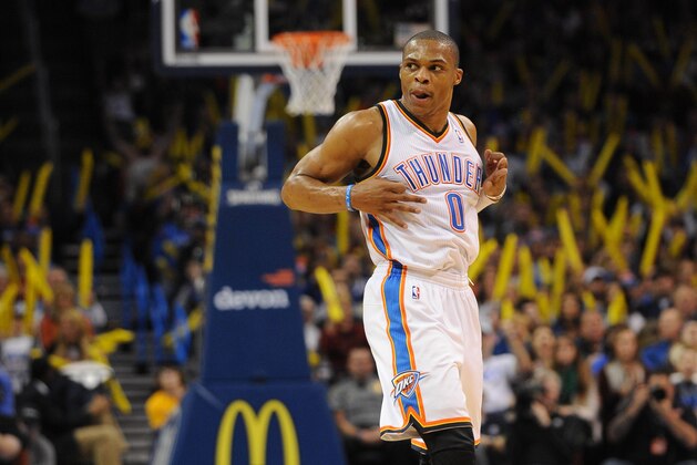 Dec 22, 2013; Oklahoma City, OK, USA; Oklahoma City Thunder point guard Russell Westbrook (0) reacts after hitting a 3-point shot in action against the Toronto Raptors during the third quarter at Chesapeake Energy Arena. Mandatory Credit: Mark D. Smith-USA TODAY Sports