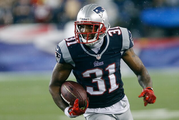 FOXBORO, MA - SEPTEMBER 12: Aqib Talib #31 of the New England Patriots runs the ball after he intercepted a pass intended for a New York Jets receiver in the 4th quarter at Gillette Stadium on September 12, 2013 in Foxboro, Massachusetts. (Photo by Jim Rogash/Getty Images)