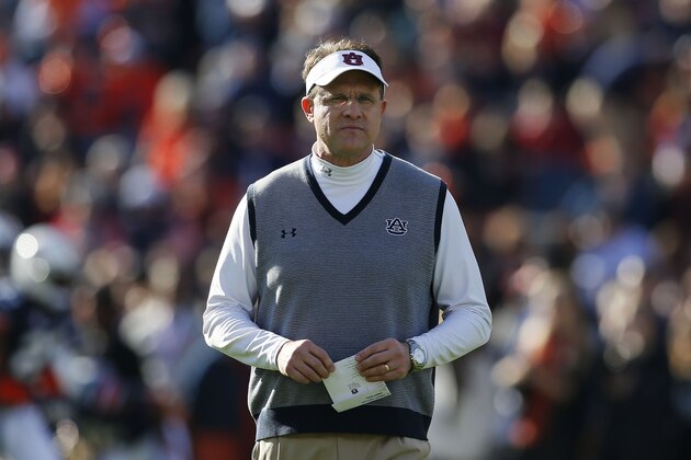 AUBURN, AL - NOVEMBER 30:  Head coach Gus Malzahn of the Auburn Tigers looks on prior to their game against the Alabama Crimson Tide at Jordan-Hare Stadium on November 30, 2013 in Auburn, Alabama.  (Photo by Kevin C. Cox/Getty Images)