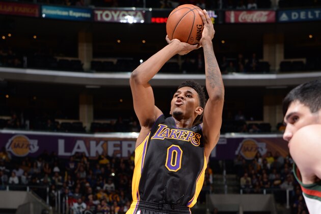 LOS ANGELES, CA - DECEMBER 31: Nick Young #0 of the Los Angeles Lakers attempts a shot during a game against the Milwaukee Bucks at STAPLES Center on December 31, 2013 in Los Angeles, California. NOTE TO USER: User expressly acknowledges and agrees that, by downloading and/or using this Photograph, user is consenting to the terms and conditions of the Getty Images License Agreement. Mandatory Copyright Notice: Copyright 2013 NBAE (Photo by Andrew D. Bernstein/NBAE via Getty Images)