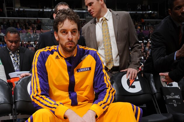 LOS ANGELES, CA - DECEMBER 31: Pau Gasol #16 of the Los Angeles Lakers waits to be introduced before a game against the Milwaukee Bucks at STAPLES Center on December 31, 2013 in Los Angeles, California. NOTE TO USER: User expressly acknowledges and agrees that, by downloading and/or using this Photograph, user is consenting to the terms and conditions of the Getty Images License Agreement. Mandatory Copyright Notice: Copyright 2013 NBAE (Photo by Andrew D. Bernstein/NBAE via Getty Images)