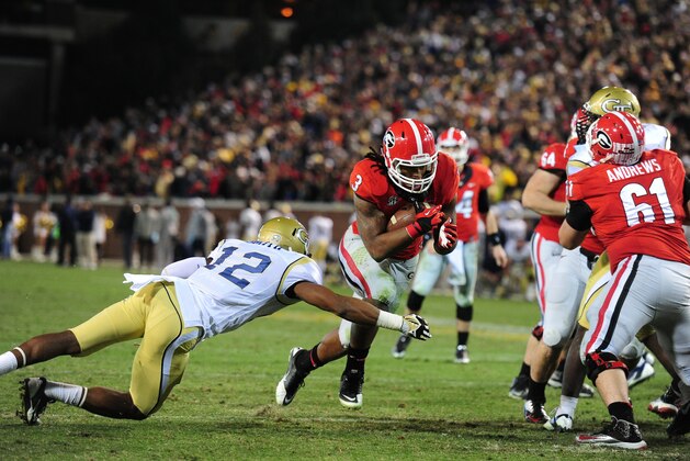 ATLANTA, GA - NOVEMBER 30: Todd Gurley #3 of the Georgia Bulldogs carries the ball for a first overtime touchdown against the Georgia Tech Yellow Jackets at Bobby Dodd Stadium on November 30, 2013 in Atlanta, Georgia. (Photo by Scott Cunningham/Getty Images)