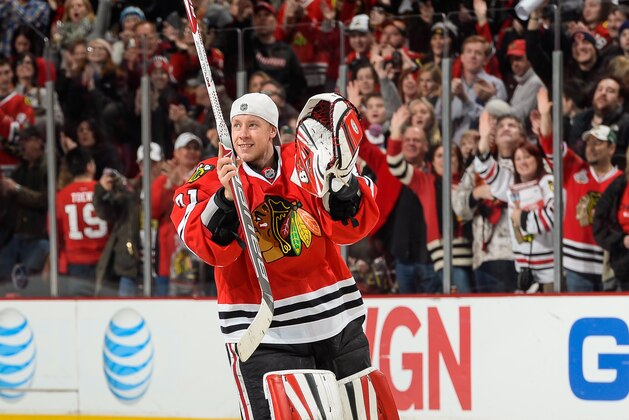 CHICAGO, IL - DECEMBER 30: Goalie Antti Raanta #31 of the Chicago Blackhawks celebrates after being named the number one player of the game for shutting out the Los Angeles Kings 1-0 during the NHL game on December 30, 2013 at the United Center in Chicago, Illinois. (Photo by Bill Smith/NHLI via Getty Images)