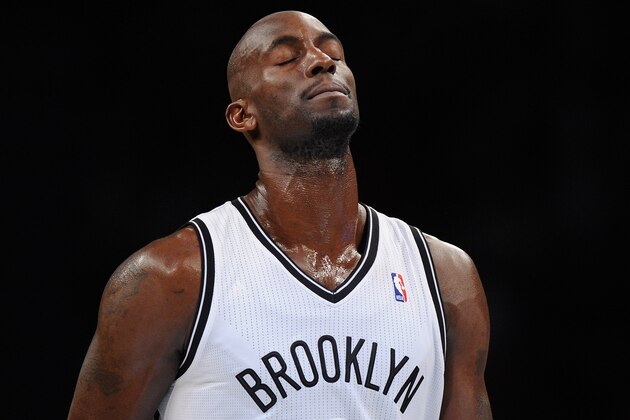 NEW YORK, NY - DECEMBER 18:  Kevin Garnett #2 of the Brooklyn Nets looks on during the second half against the Washington Wizards at Barclays Center on December 18, 2013 in the Brooklyn borough of New York City. The Wizards defeat the Nets 113-107. NOTE TO USER: User expressly acknowledges and agrees that, by downloading and/or using this photograph, user is consenting to the terms and conditions of the Getty Images License Agreement.  (Photo by Maddie Meyer/Getty Images)