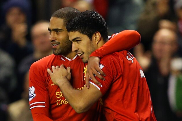 LIVERPOOL, ENGLAND - JANUARY 01: Luis Suarez of Liverpool celebrates scoring their second goal with Glen Johnson of Liverpool during the Barclays Premier League match between Liverpool and Hull City at Anfield on January 1, 2014 in Liverpool, England. (Photo by Clive Brunskill/Getty Images) LIVERPOOL, ENGLAND - JANUARY 01: Luis Suarez of Liverpool celebrates scoring their second goal with Glen Johnson of Liverpool during the Barclays Premier League match between Liverpool and Hull City at Anfield on January 1, 2014 in Liverpool, England. (Photo by Clive Brunskill/Getty Images)