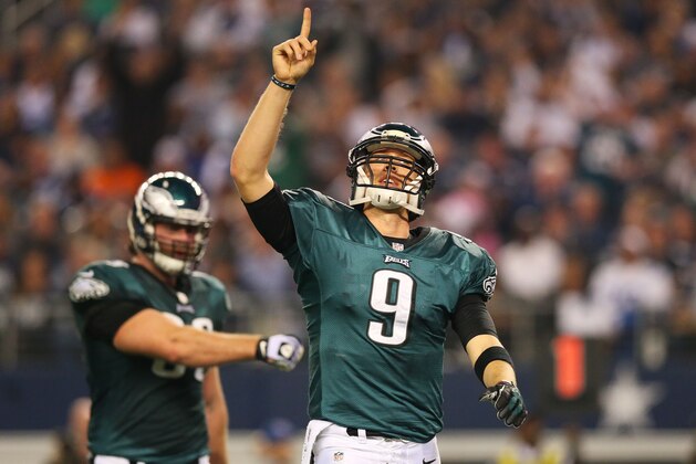 ARLINGTON, TX - DECEMBER 29:  Nick Foles #9 of the Philadelphia Eagles celebrates a second quarter touchdown against the Dallas Cowboys at Cowboys Stadium on December 29, 2013 in Arlington, Texas.  (Photo by Ronald Martinez/Getty Images)