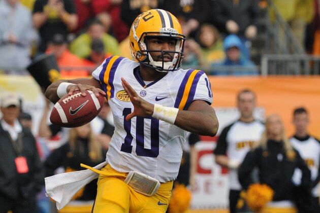TAMPA, FL - JANUARY 1: Quarterback Anthony Jennings #10 of the LSU Tigers sets to pass in the second quarter against the Iowa Hawkeyes January 1, 2014 in the Outback Bowl at Raymond James Stadium in Tampa, Florida. (Photo by Al Messerschmidt/Getty Images) TAMPA, FL - JANUARY 1: Quarterback Anthony Jennings #10 of the LSU Tigers sets to pass in the second quarter against the Iowa Hawkeyes January 1, 2014 in the Outback Bowl at Raymond James Stadium in Tampa, Florida. (Photo by Al Messerschmidt/Getty Images)