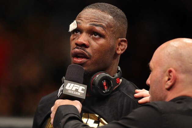 Sep 21, 2013; Toronto, Ontario, CAN; Jon Jones is interviewed by Joe Rogan after defeating Alexander Gustafsson (not pictured) during their light heavyweight championship bout at UFC 165 at the Air Canada Centre. Mandatory Credit: Tom Szczerbowski-USA TODAY Sports