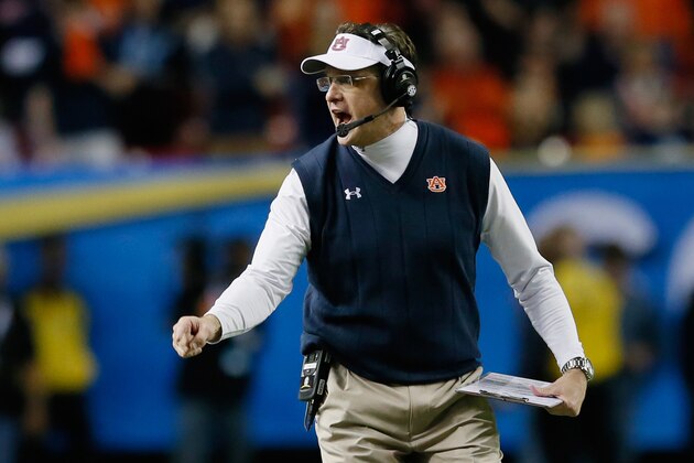 ATLANTA, GA - DECEMBER 07: Head coach Gus Malzahn of the Auburn Tigers calls a play from the sideline in the third quarter against the Missouri Tigers during the SEC Championship Game at Georgia Dome on December 7, 2013 in Atlanta, Georgia.  (Photo by Kevin C. Cox/Getty Images)
