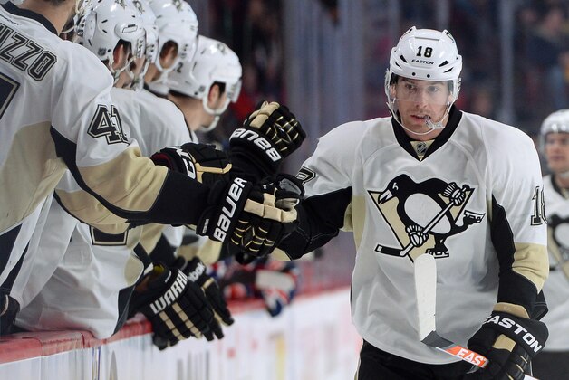 MONTREAL, QC - NOVEMBER 23: James Neal #18 of the Pittsburgh Penguins, celebrates after scoring a goal against the Montreal Canadiens during the NHL game on November 23, 2013 at the Bell Centre in Montreal, Quebec, Canada. (Photo by Francois Lacasse/NHLI via Getty Images)
