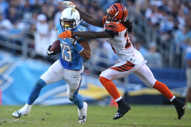 SAN DIEGO, CA - DECEMBER 01: Wide receiver Keenan Allen #13 of the San Diego Chargers gets away from cornerback Adam Jones #2 of the Cincinnati Bengals at Qualcomm Stadium on December 1, 2013 in San Diego, California. The Bengals won 17-10.  (Photo by Stephen Dunn/Getty Images)