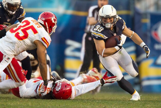Dec 29, 2013; San Diego, CA, USA; San Diego Chargers running back Danny Woodhead (39) carries the ball in overtime during the Chargers 27-24 overtime win over the Kansas City Chiefs at Qualcomm Stadium. Mandatory Credit: Stan Liu-USA TODAY Sports Dec 29, 2013; San Diego, CA, USA; San Diego Chargers running back Danny Woodhead (39) carries the ball in overtime during the Chargers 27-24 overtime win over the Kansas City Chiefs at Qualcomm Stadium. Mandatory Credit: Stan Liu-USA TODAY Sports