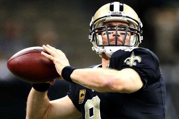 NEW ORLEANS, LA - DECEMBER 29:  Drew Brees #9 of the New Orleans Saints warms up before his team takes on the Tampa Bay Buccaneers at Mercedes-Benz Superdome on December 29, 2013 in New Orleans, Louisiana.  (Photo by Sean Gardner/Getty Images)