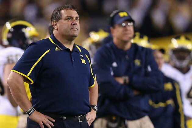 TEMPE, AZ - DECEMBER 28:  Head coach Brady Hoke of the Michigan Wolverines watches from the sidelines during the first quarter of the Buffalo Wild Wings Bowl against the Kansas State Wildcats at Sun Devil Stadium on December 28, 2013 in Tempe, Arizona.  (Photo by Christian Petersen/Getty Images)