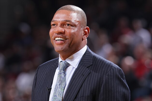 PORTLAND, OR - DECEMBER 26:  Doc Rivers of the Los Angeles Clippers smiles against the Portland Trail Blazers on December 26, 2013 at the Moda Center Arena in Portland, Oregon. NOTE TO USER: User expressly acknowledges and agrees that, by downloading and or using this photograph, user is consenting to the terms and conditions of the Getty Images License Agreement. Mandatory Copyright Notice: Copyright 2013 NBAE (Photo by Sam Forencich/NBAE via Getty Images)