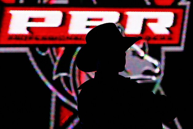 NEW YORK - JANUARY 06:  Mike Lee Stands during introductions during the Versus Invitational Professional Bull Riding (PBR) Tournament on January 6, 2007 at Madison Square Garden in New York City. Approximately forty five bull riders from around the world will compete in the two-day event in New York.  (Photo by Al Bello/Getty Images)