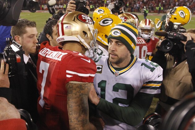 Jan 12, 2013; San Francisco, CA, USA; Green Bay Packers quarterback Aaron Rodgers (12) congratulates San Francisco 49ers quarterback Colin Kaepernick (7) after the NFC divisional round playoff game at Candlestick Park.  The 49ers defeated the Packers 45-31. Mandatory Credit: Cary Edmondson-USA TODAY Sports