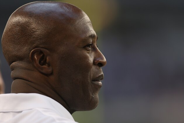 ARLINGTON, TX - OCTOBER 01:  Head coach Lovie Smith of the Chicago Bears walks on the field during warm ups against the Dallas Cowboys at Cowboys Stadium on October 1, 2012 in Arlington, Texas.  (Photo by Ronald Martinez/Getty Images)